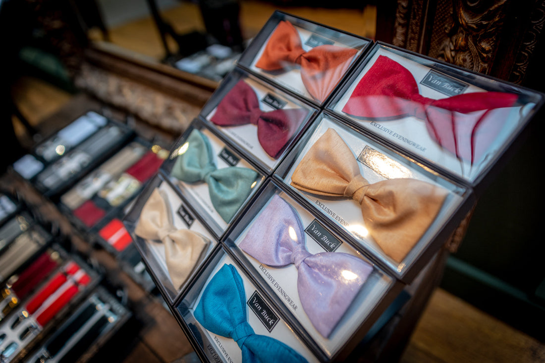 Colourful bow ties and braces.