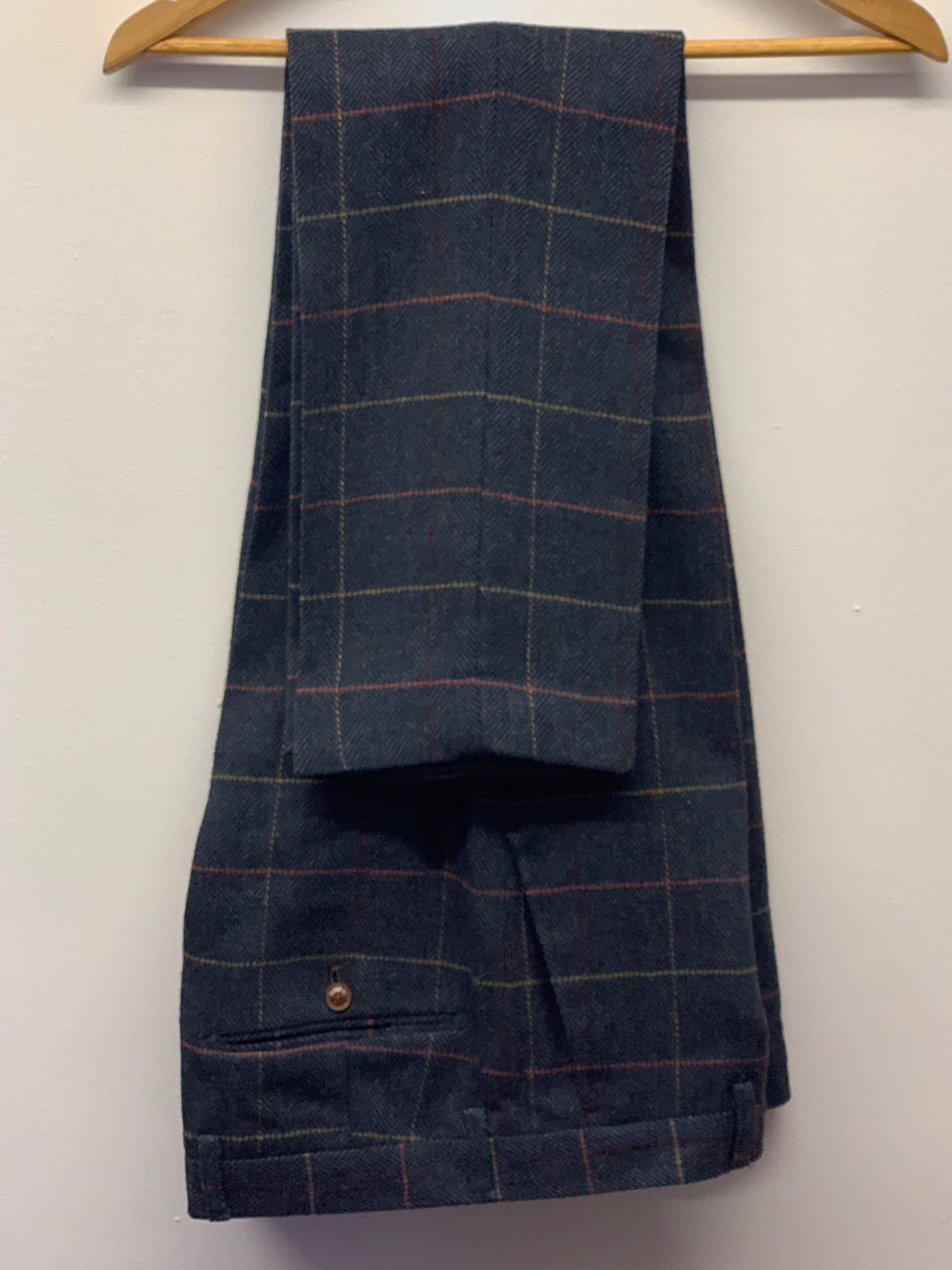 Marc Darcy Eton Tweed Check Trousers hung up